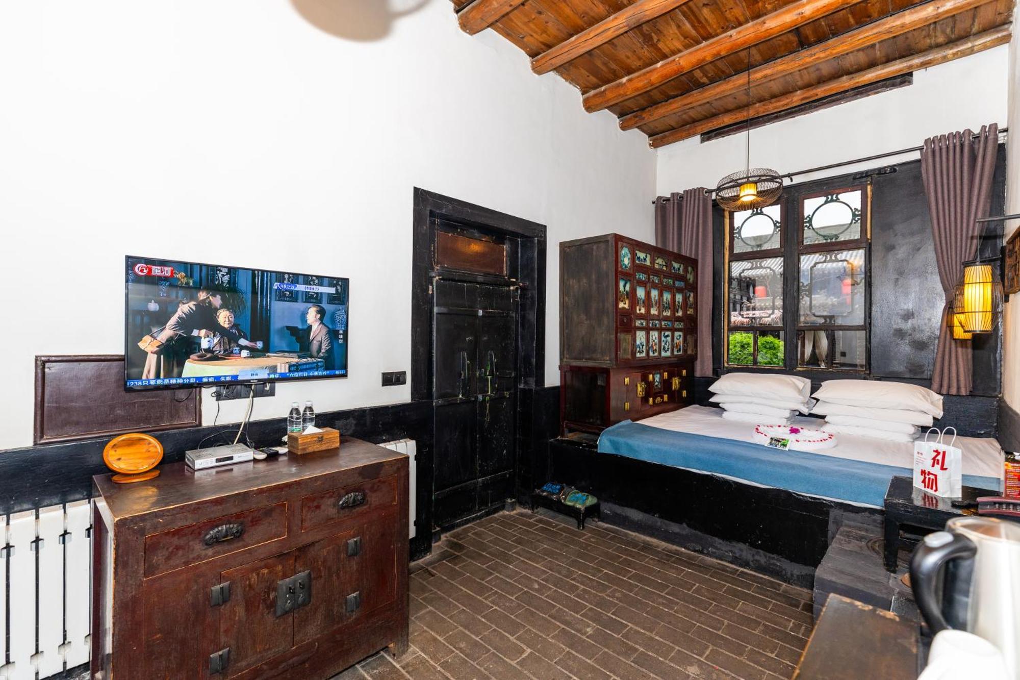 Elsewhere Hotel The Former Residence Of The Draft Bank Pingyao Bagian luar foto