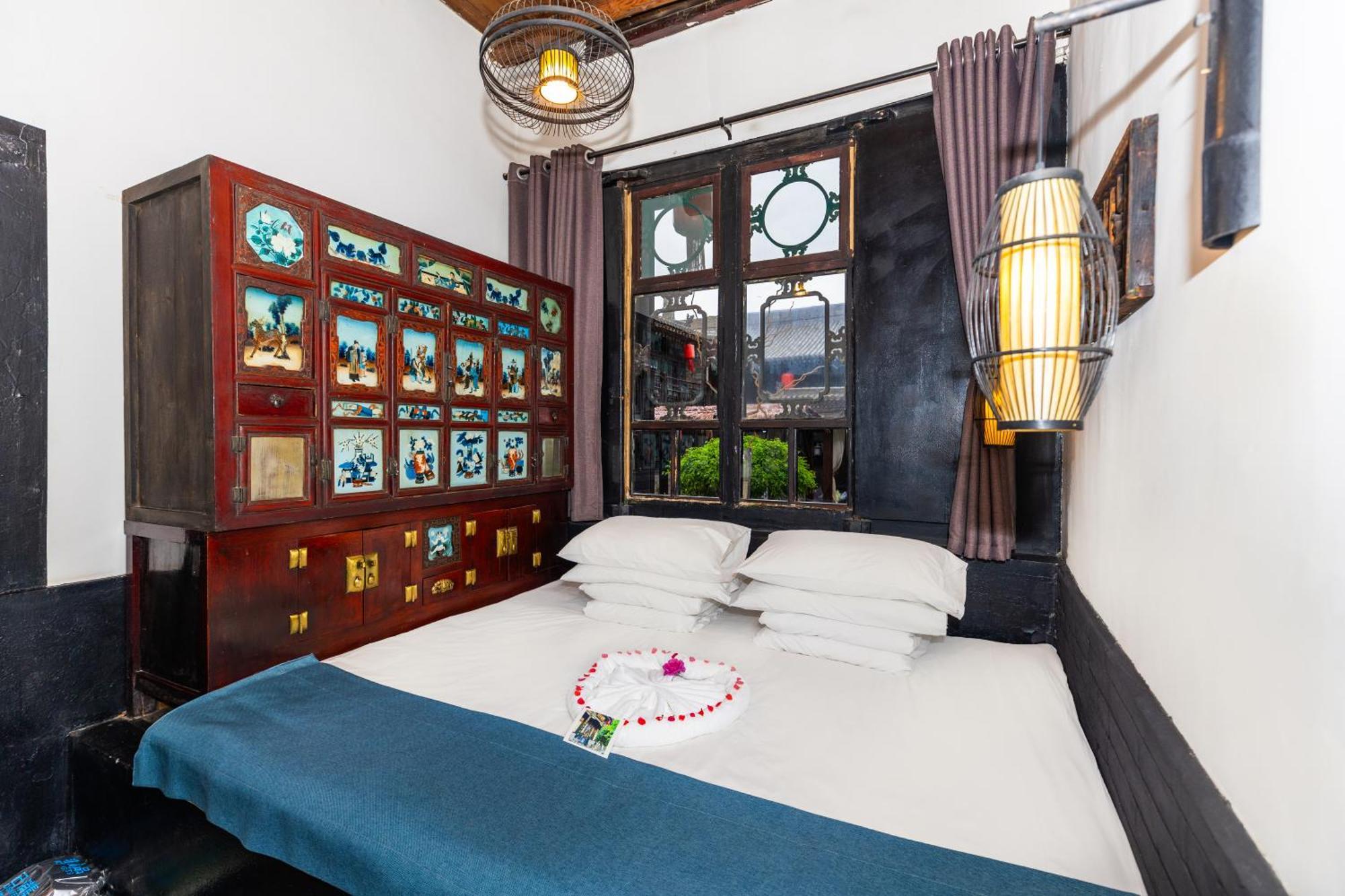 Elsewhere Hotel The Former Residence Of The Draft Bank Pingyao Bagian luar foto