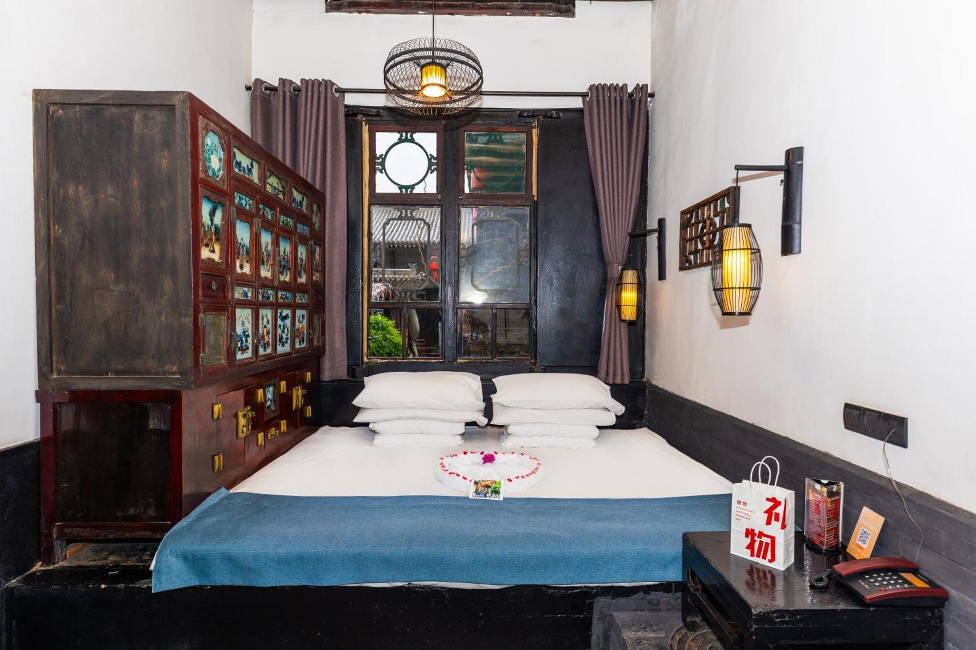 Elsewhere Hotel The Former Residence Of The Draft Bank Pingyao Bagian luar foto