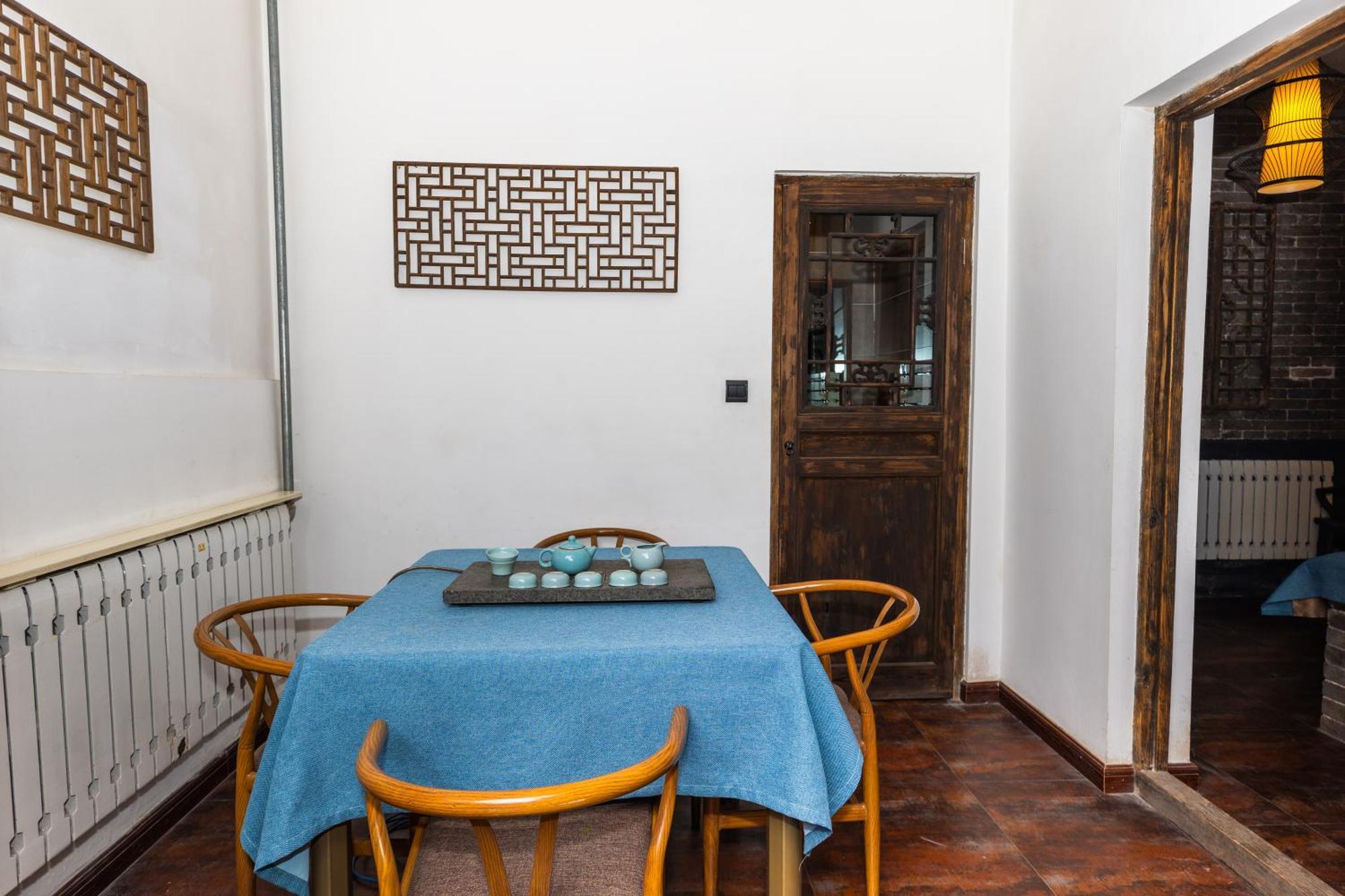 Elsewhere Hotel The Former Residence Of The Draft Bank Pingyao Bagian luar foto