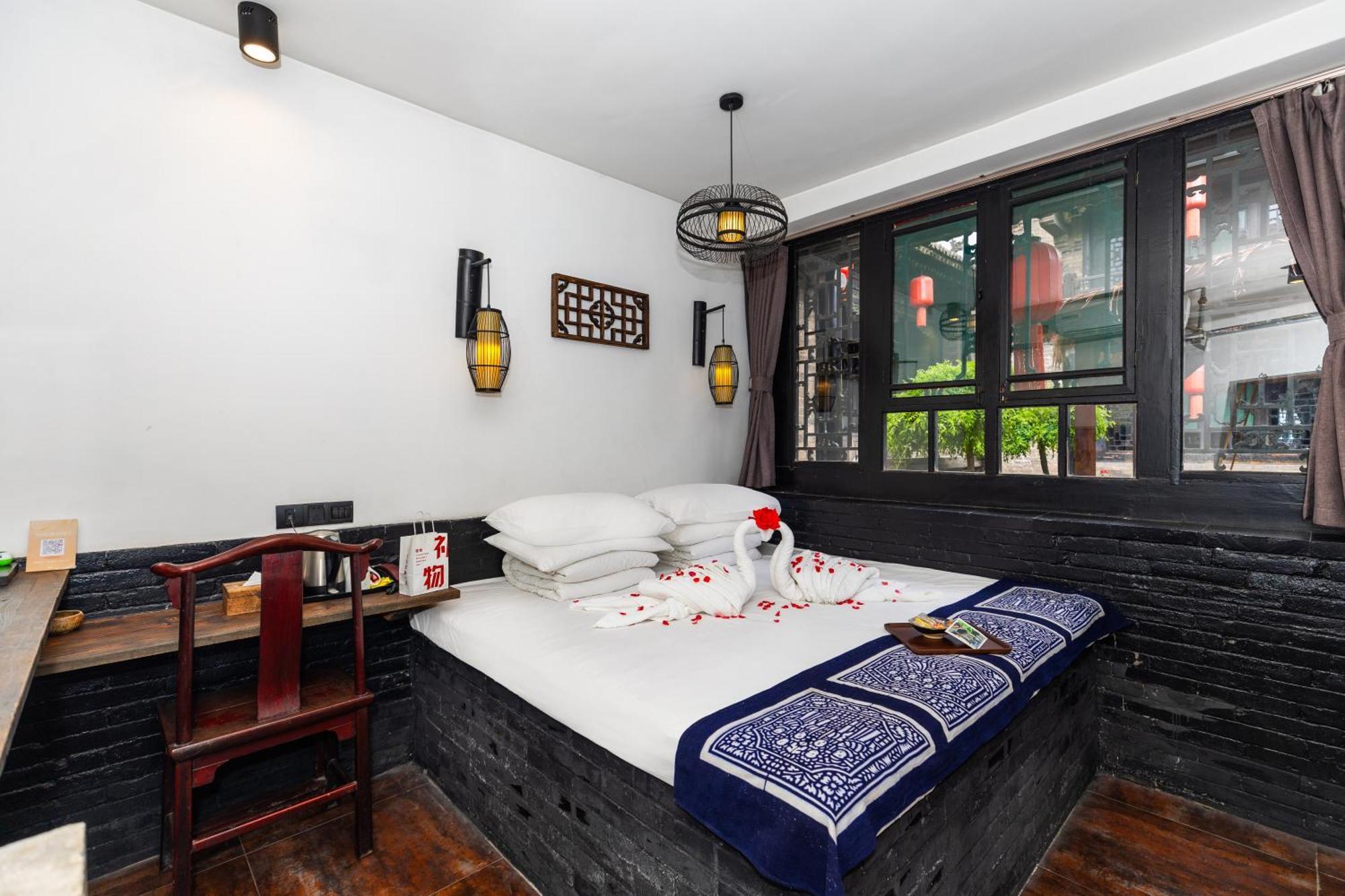 Elsewhere Hotel The Former Residence Of The Draft Bank Pingyao Bagian luar foto