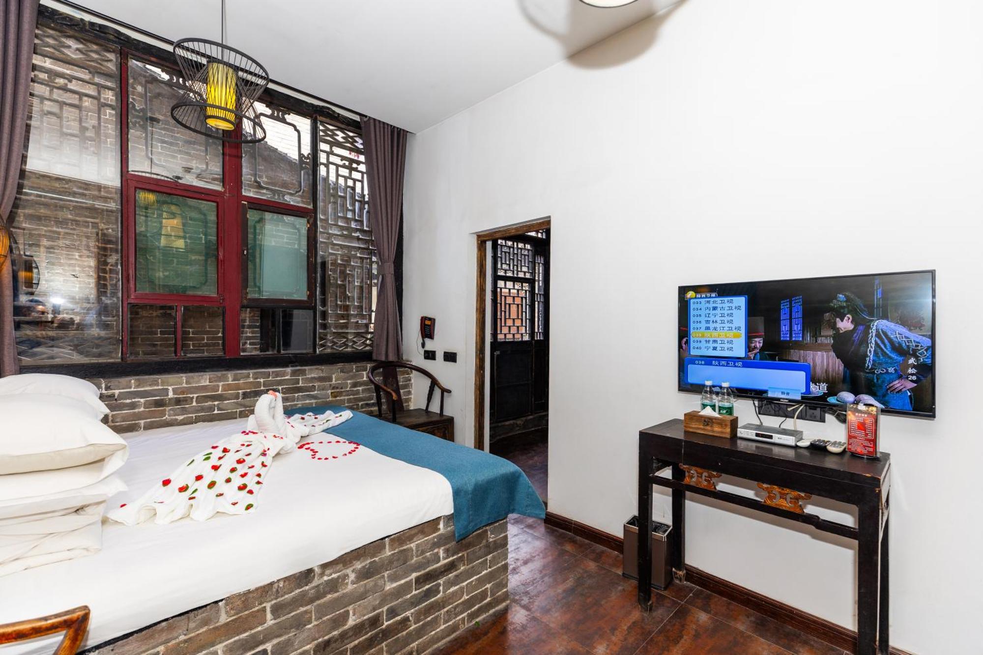 Elsewhere Hotel The Former Residence Of The Draft Bank Pingyao Bagian luar foto