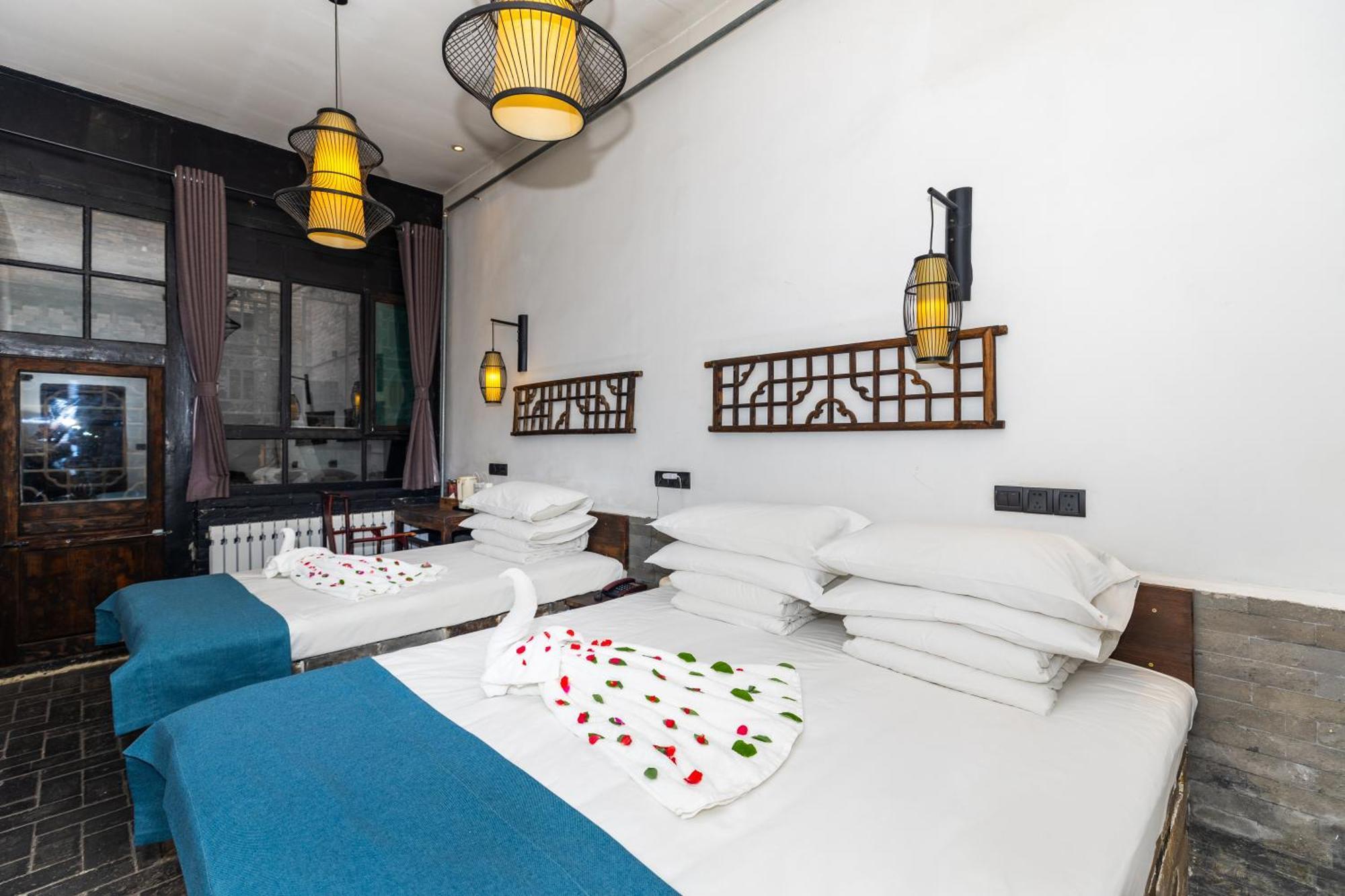 Elsewhere Hotel The Former Residence Of The Draft Bank Pingyao Bagian luar foto