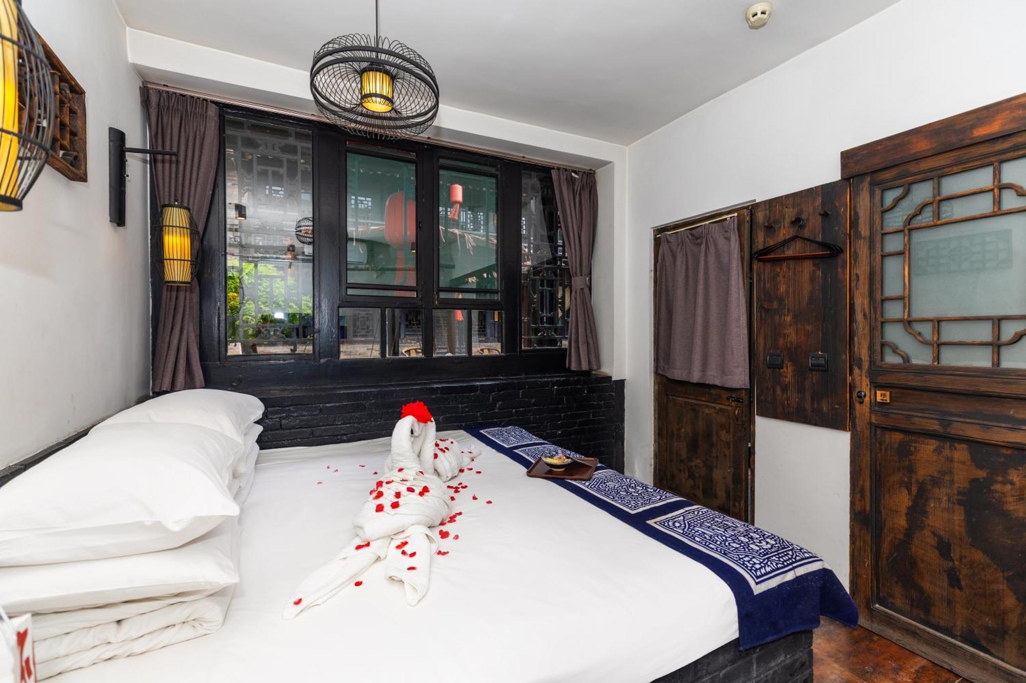 Elsewhere Hotel The Former Residence Of The Draft Bank Pingyao Bagian luar foto